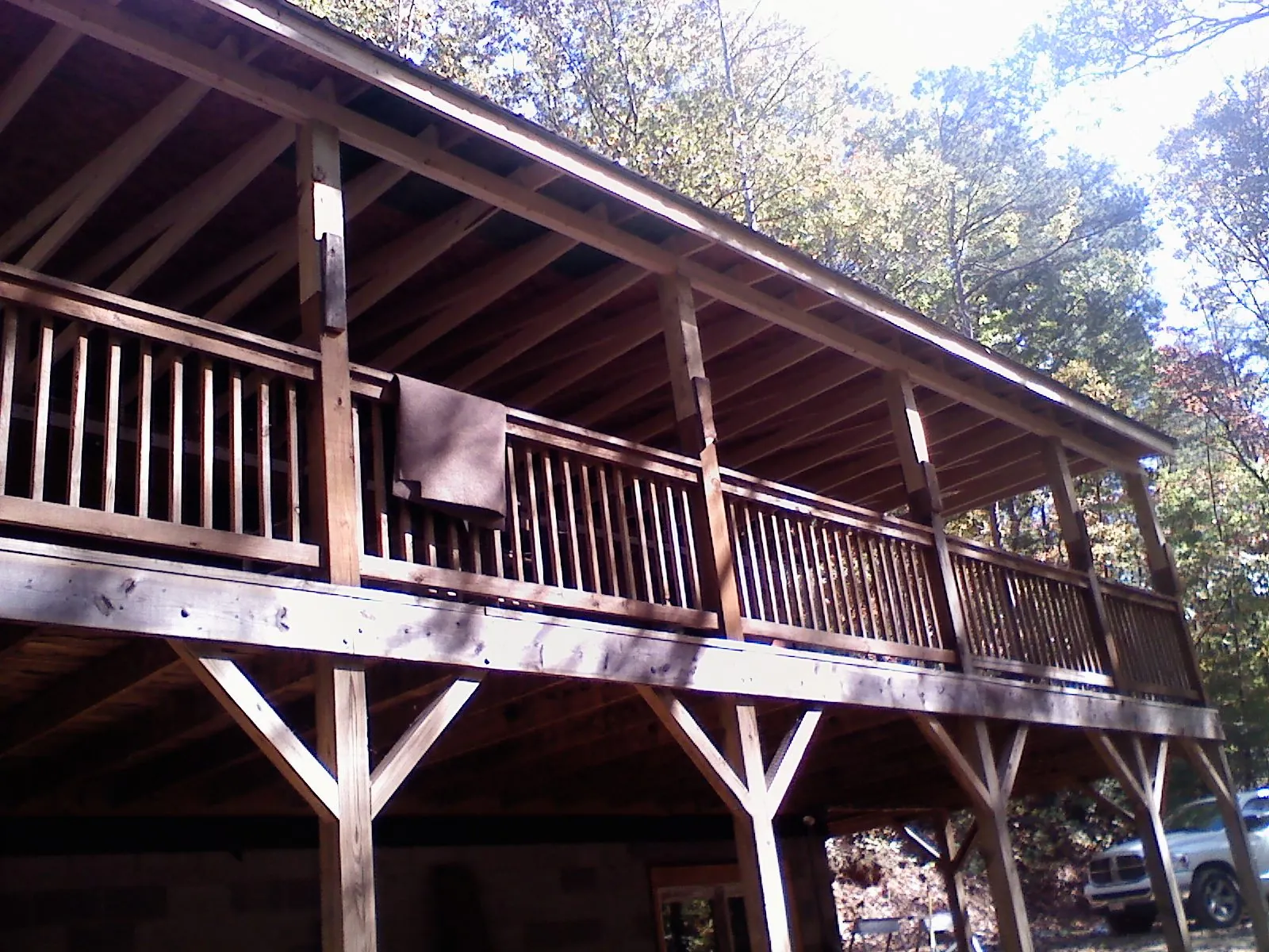 Timber framing under a new elevated porch and deck — Roof Leak Repair in Winnett by Roofing Brothers